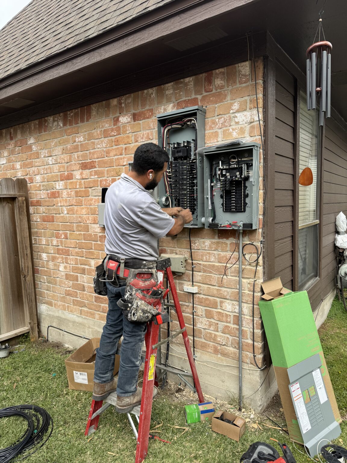 The Shock Doc electrician installing residential electrical panels in Clear Lake, Houston, TX